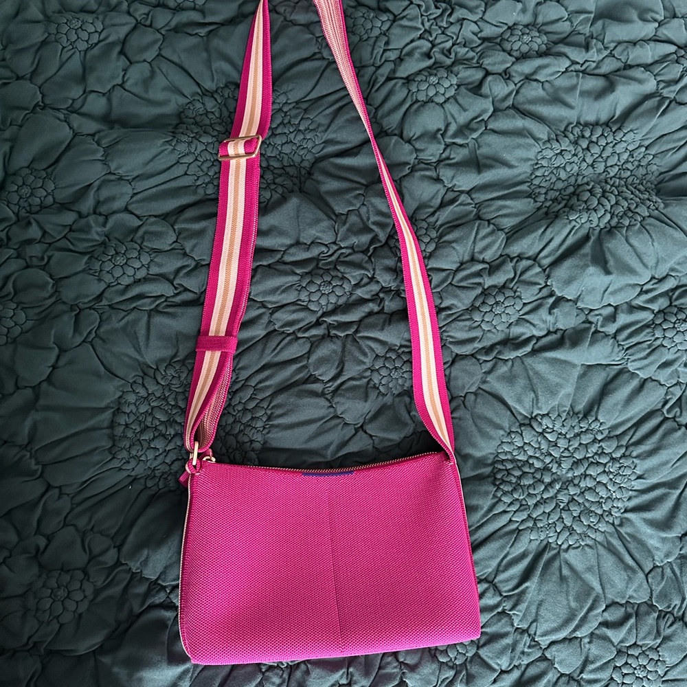 NWOT Rothy’s Casual Crossbody in Discontinued Tulip Petal. Never used.